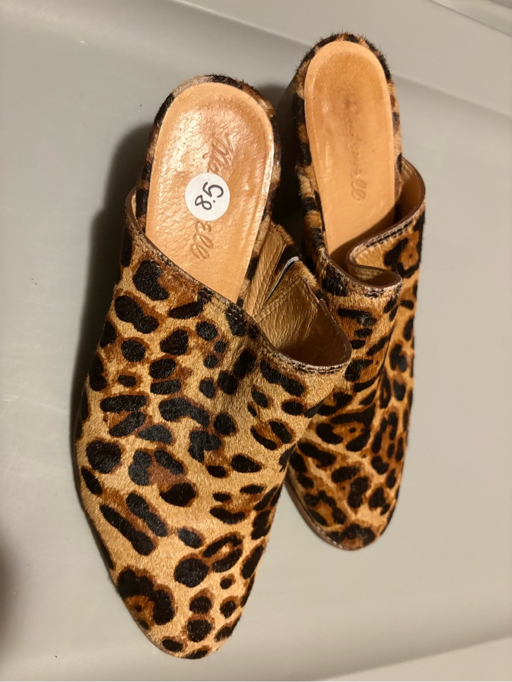 Madewell Leopard-Print Slip-On Mules in Tan leather and Black